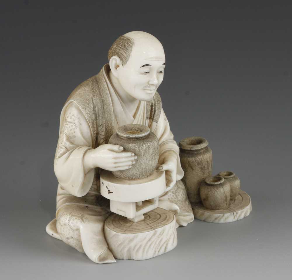 A 4" ivory okimono of a potter at his wheel - Image 3 of 5