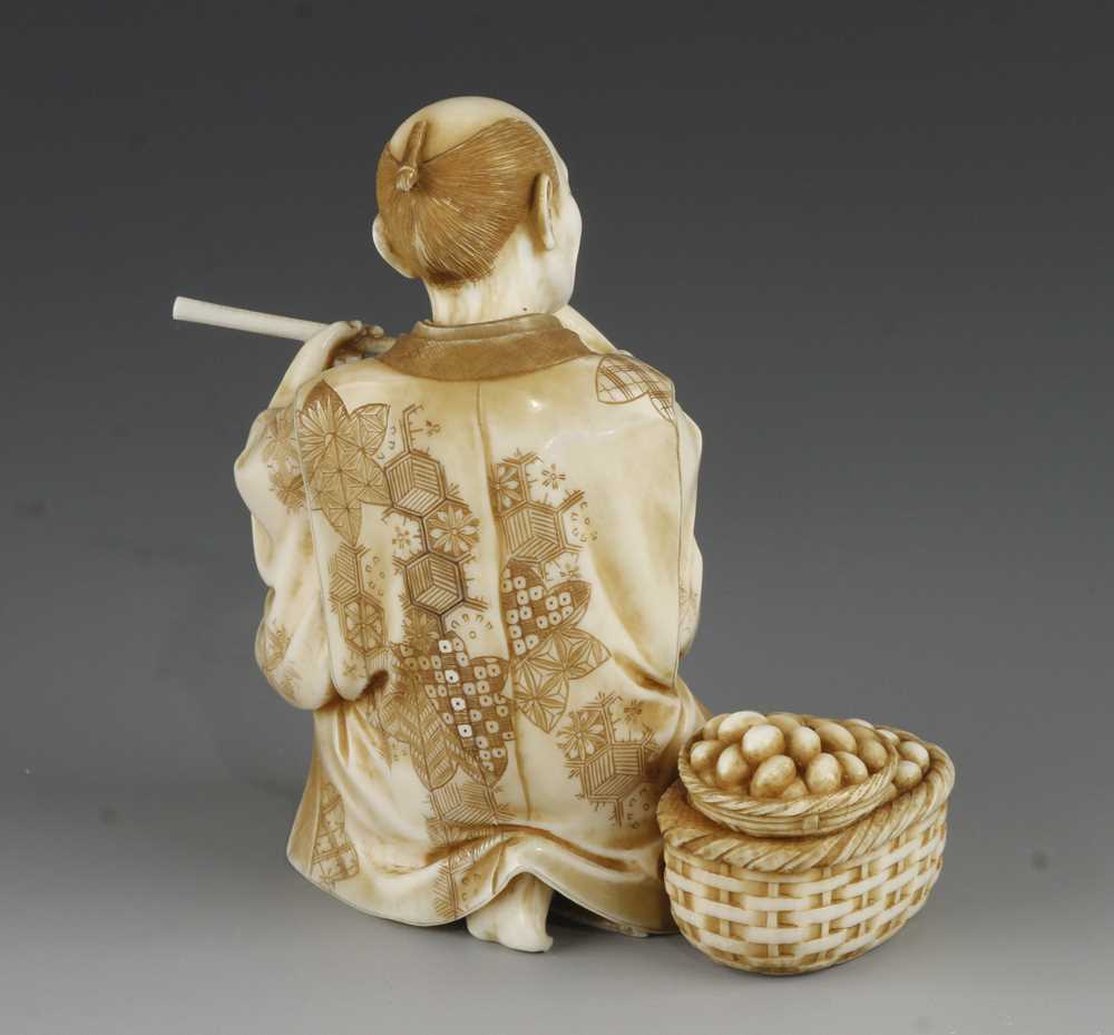 A 4" ivory okimono of a man weighing eggs signed - Image 3 of 6