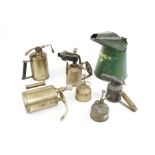 A one gallon oil jug by DUCKHAMS ( part label), two brass blow torches and four sprays G+