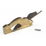 An attractive steel soled brass rebate plane 5 1/4" x 1/2" with rosewood infill and wedge G+