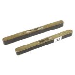 Two brass topped ebony levels 9" and 10" G+
