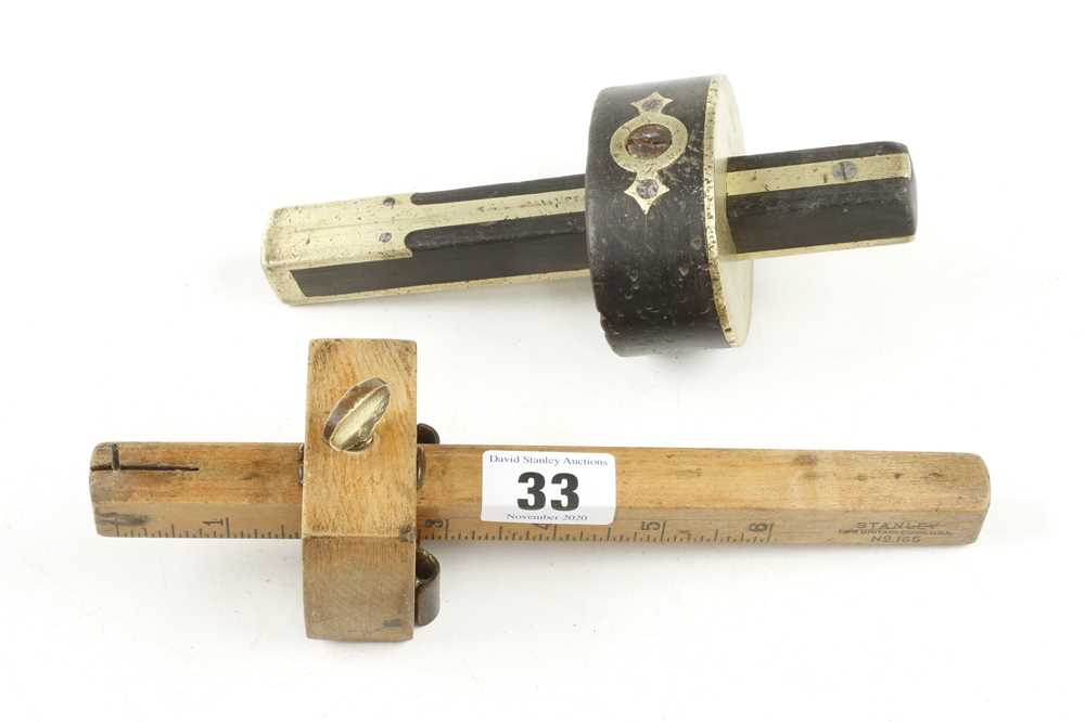 A USA STANLEY No 165 boxwood marking gauge and a rosewood and brass gauge G+