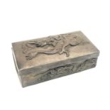 A Chinese silver and hardwood cigar box, 19th century, signed, decorated with dragons in relief,