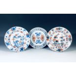 Three Chinese Imari porcelain plates, 18th century, diameters 22.5cm, 22cm and 22.5cm.Condition