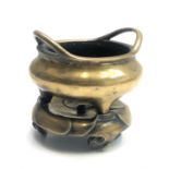 A Chinese bronze tripod censer and stand, 18th century, with two loop handles on the rim above a