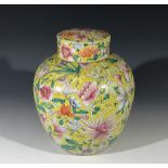 A Chinese millefleur porcelain ginger jar and cover, circa 1900, with a yellow ground and blue