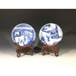 Two Chinese blue and white porcelain dishes, Kangxi Period, each with figures and verse, together