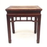 A Chinese small hardwood table, 19th century, with an openwork frieze on square section legs, height