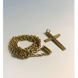 A 9ct gold cross 1.1gm and a high purity gold chain 6.2gmCondition report: The chain 43cm long.