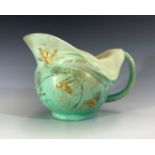 A late 19th/early 20th century Clement Massier art pottery jug, with folded rim and 'dew drop',