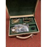 A box of costume jewellery.