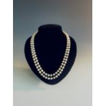 A necklace of approximately 114 cultured pearls each 7-7.5mm full length 102cmCondition report: No