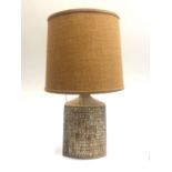 A Tremaen studio pottery table lamp with shade. Height 72cm overall.
