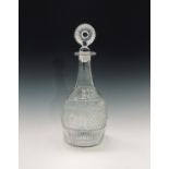 An early American blown and moulded glass decanter and stopper, with pontil mark.Height 27.5cm.