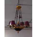 A brass and lacquered Empire style four branch electrolier. Height 65cm.