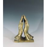 A pair of brass bookends cast as praying hands, after Albrecht Durer, height 18cm.