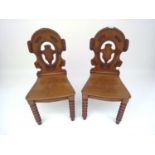 A pair of Victorian oak hall chairs, with bobbin turned legs, height 91cm.Condition report: Very