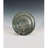 A Liberty & Co 'Tudric' hammered circular dish, impressed marks and numbers 01884 to base,