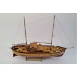 A scratch built model of a Bruma Cruiser yacht, with twin masts, detailed deck fittings, complete