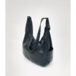 A Loro Piana black leather shoulder tote bag with two inner pockets.Condition report: A number of