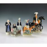 Three 19th century Staffordshire flatback ornaments, depicting 'D.Turpin', height 26cm, school