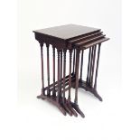 A Regency style mahogany crossbanded quartetto of tables, on turned column supports, height 70cm,