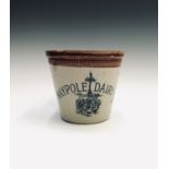 An early 20th century 'Maypole Dairy Co. Ltd.' stoneware butter crock, impressed '4LB', with handle.