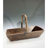 A 19th century rustic elm trug, with plain angled plank sides and 'twig' handle. Length 65cm.