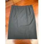 A short black smart pencil skirt, wool, by Gucci.