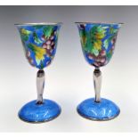 A pair of Chinese silver coloured metal and cloisonne enamel wine cups 179gm, boxedCondition report: