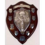 A large mid 20th century mahogany shield shape motorcycling trophy, 'The Eleanor Middleton Trophy