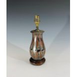 A French Art Deco period mixed metal table lamp of baluster form, on hardwood base. Overall height