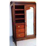 A Victorian burr walnut gentlemen's press, with two doors enclosing four sliding shelves, the