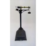 A set of late 19th/early 20th century cast metal medial scales by Mawson & Sons London. Height