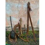 A ships anchor with single fluke, length 123cm , two smaller anchors 71 and 55 1/2 cm, a bronze