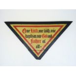 A painted wooden panel of inverted triangular form, inscribed 'One Lord, one faith, one baptism, one