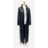 A floor length butter soft black leather coat by Betty Jackson, unlined, slim collar, no fastenings,