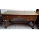 A French mahogany Empire-style desk, with gilt metal mounts and a rectangular green leather inset