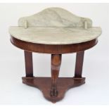 A Victorian mahogany bow front marble top washstand, height 85cm, width 91cm.
