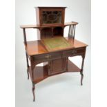 An Arts & Crafts mahogany lady's writing desk, by Shapland and Petter, Barnstable, with a single
