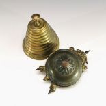 An early 20th century clockwork table bell in the form of a mythical beast, length 12cm, together