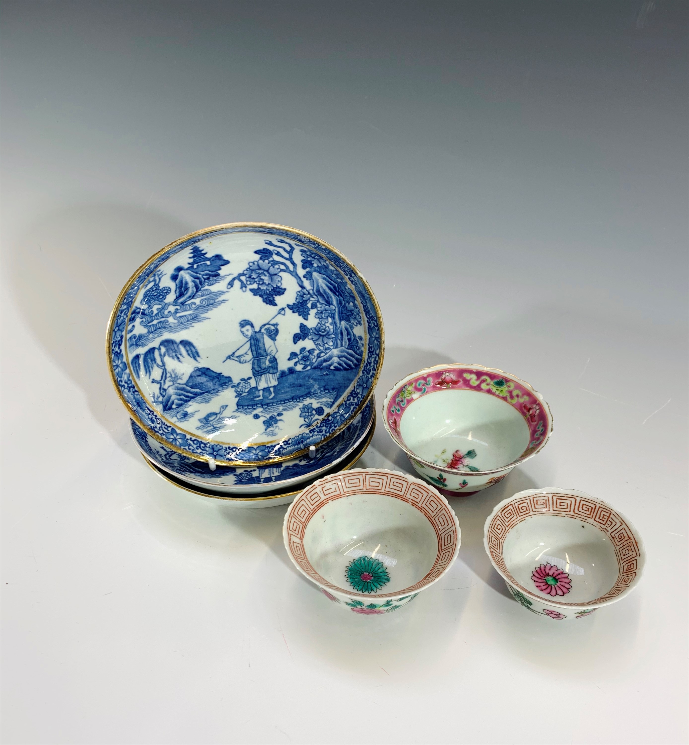 Three Chinese porcelain famille verte tea bowls and three blue and white saucer dishes.Condition