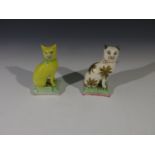 Two Staffordshire type seated cat ornaments. Height 10cm.