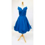 A kingfisher blue satin dress, fitted bodice with ruched tulip skirt, size zip, approximate size