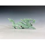 A Chinese hardstone carving of a dragon, length 27cm.