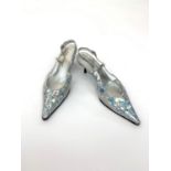 A pair of vintage size 40.5 silver holograph slingbacks by Dolce & Gabbana.