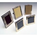 Five silver mounted photograph framesCondition report: The pair of plain modern frames is in good