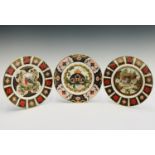 Three Royal Crown Derby limited edition Christmas plates (1993, 1996 and1997). Diameter 22cm.