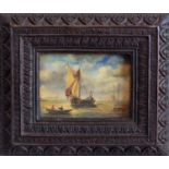 A reproduction maritime picture with a sailing barge, in ornate resin frame, 12 x 16cm.