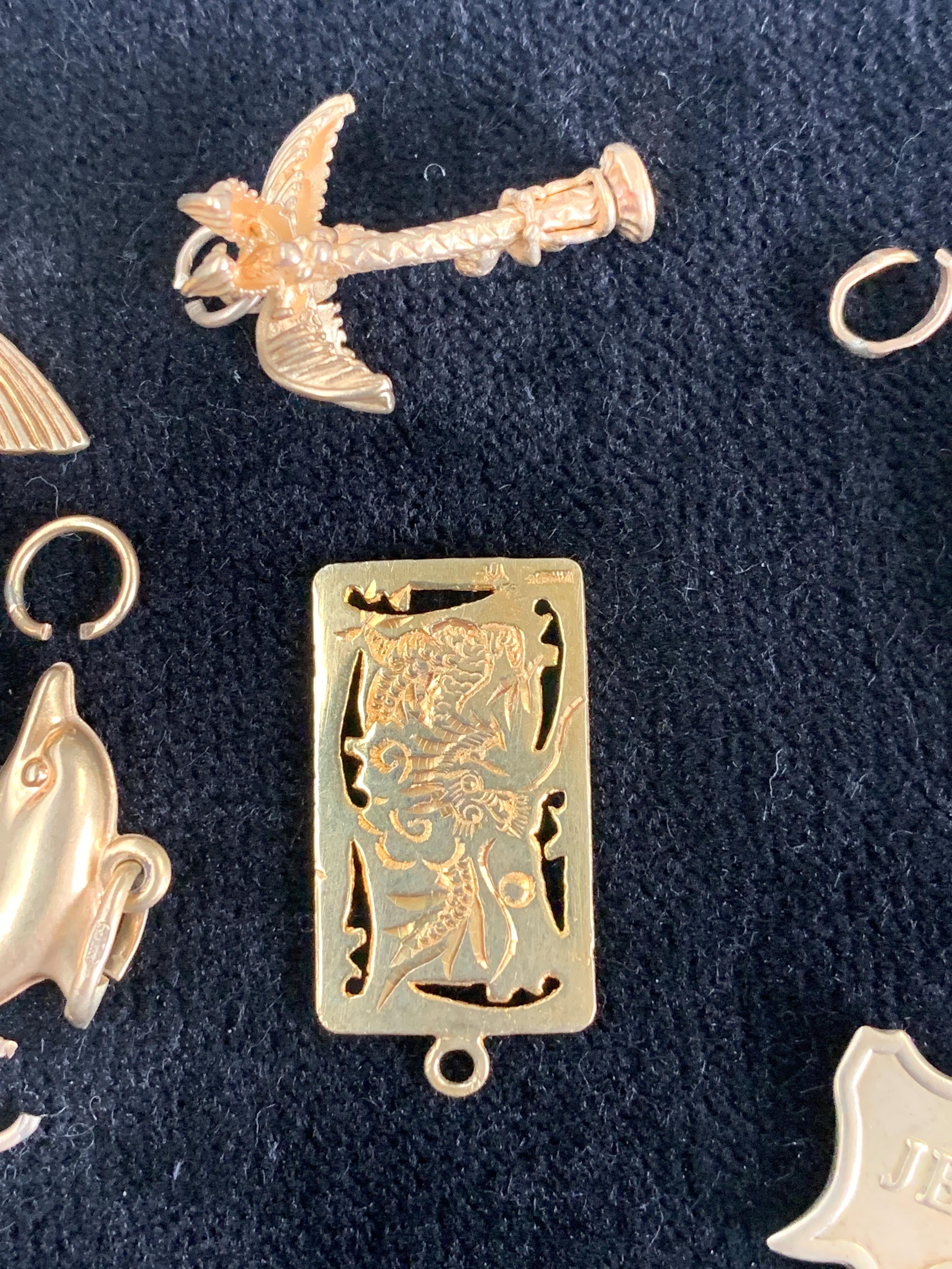 A Chinese high purity gold charm 2.2gm and five other gold charms tog with gold rings 14.2gm - Image 4 of 4